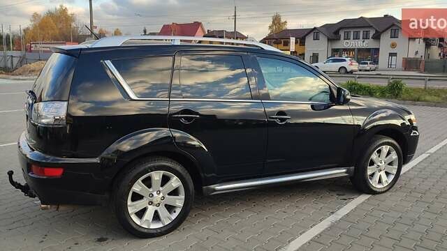Черный Мицубиси Аутлендер, объемом двигателя 2 л и пробегом 210 тыс. км за 10600 $, фото 7 на Automoto.ua