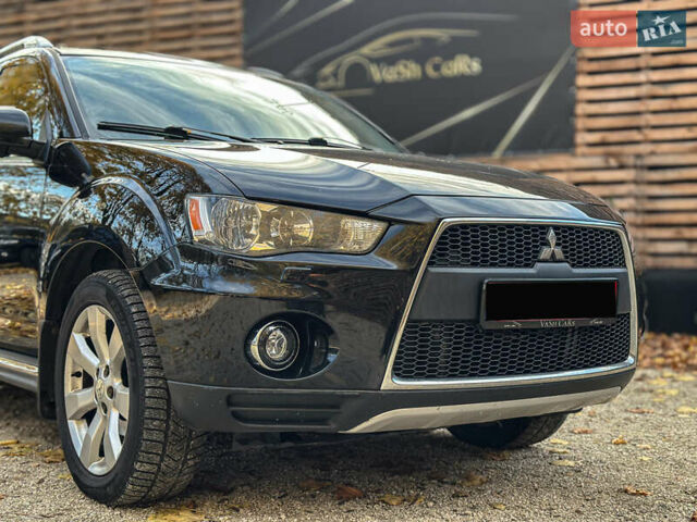 Черный Мицубиси Аутлендер, объемом двигателя 2.2 л и пробегом 226 тыс. км за 11500 $, фото 24 на Automoto.ua