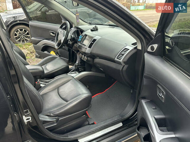 Чорний Міцубісі Аутлендер, об'ємом двигуна 2.36 л та пробігом 197 тис. км за 11300 $, фото 13 на Automoto.ua