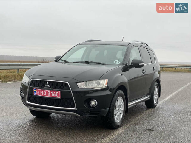 Черный Мицубиси Аутлендер, объемом двигателя 2.2 л и пробегом 227 тыс. км за 10700 $, фото 2 на Automoto.ua