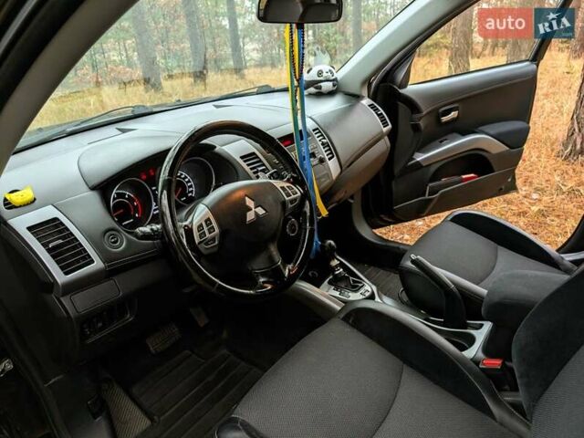 Чорний Міцубісі Аутлендер, об'ємом двигуна 2.18 л та пробігом 205 тис. км за 10200 $, фото 7 на Automoto.ua