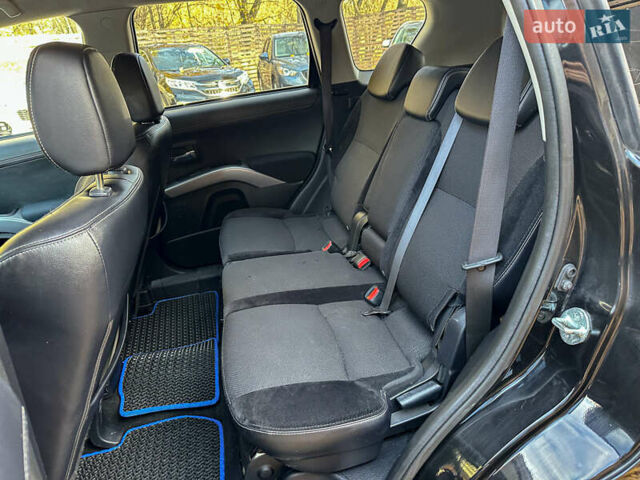 Черный Мицубиси Аутлендер, объемом двигателя 2.2 л и пробегом 226 тыс. км за 11500 $, фото 79 на Automoto.ua