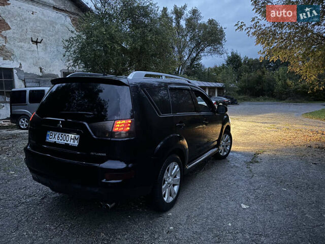 Чорний Міцубісі Аутлендер, об'ємом двигуна 2 л та пробігом 258 тис. км за 8699 $, фото 16 на Automoto.ua