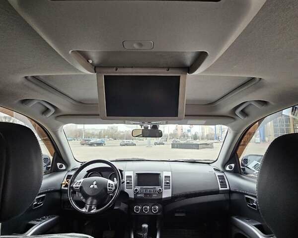 Чорний Міцубісі Аутлендер, об'ємом двигуна 2.4 л та пробігом 70 тис. км за 13000 $, фото 19 на Automoto.ua