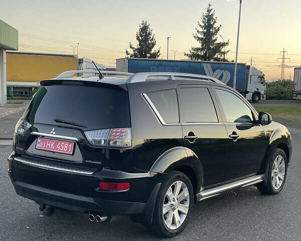 Черный Мицубиси Аутлендер, объемом двигателя 0 л и пробегом 257 тыс. км за 10399 $, фото 4 на Automoto.ua