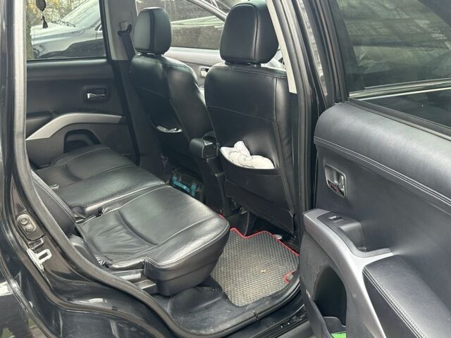 Черный Мицубиси Аутлендер, объемом двигателя 2.4 л и пробегом 197 тыс. км за 11300 $, фото 7 на Automoto.ua