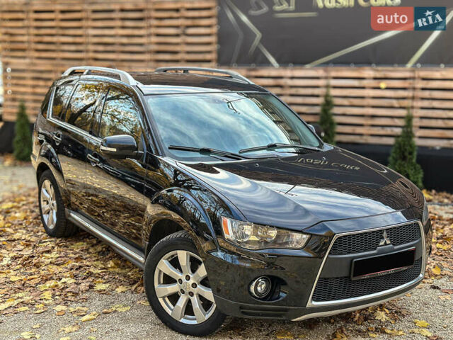 Черный Мицубиси Аутлендер, объемом двигателя 2.2 л и пробегом 226 тыс. км за 11500 $, фото 8 на Automoto.ua