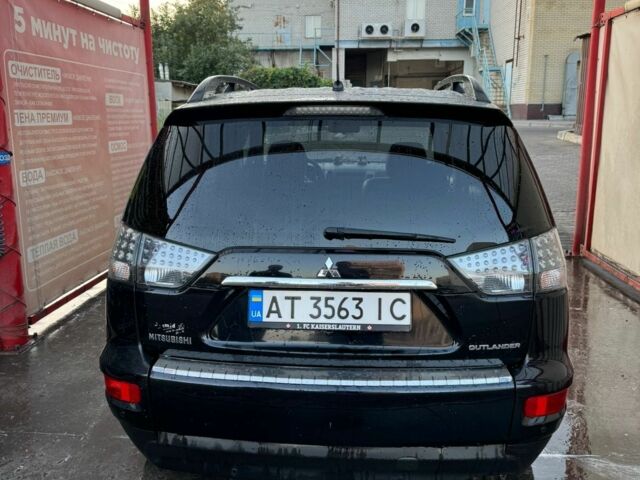 Черный Мицубиси Аутлендер, объемом двигателя 0 л и пробегом 215 тыс. км за 9500 $, фото 3 на Automoto.ua