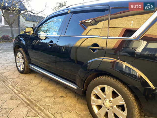 Черный Мицубиси Аутлендер, объемом двигателя 1.97 л и пробегом 292 тыс. км за 10900 $, фото 13 на Automoto.ua