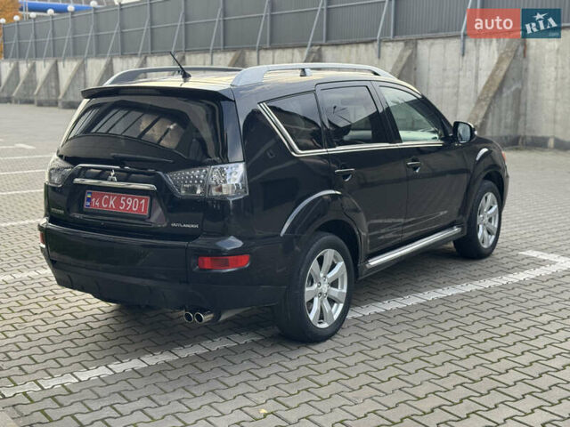 Черный Мицубиси Аутлендер, объемом двигателя 2.2 л и пробегом 225 тыс. км за 10950 $, фото 16 на Automoto.ua