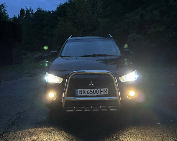 Чорний Міцубісі Аутлендер, об'ємом двигуна 2 л та пробігом 258 тис. км за 8699 $, фото 13 на Automoto.ua