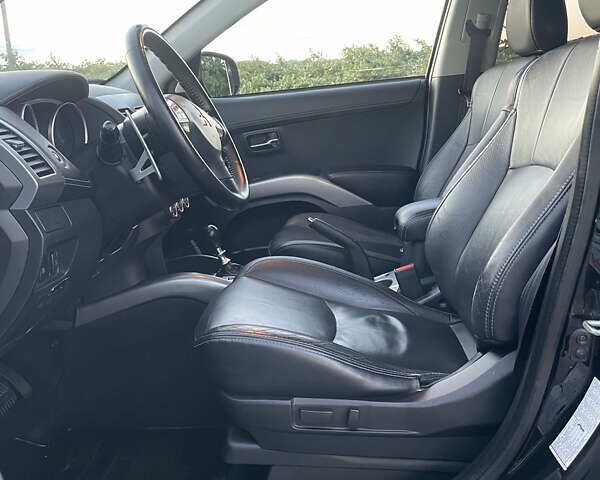 Черный Мицубиси Аутлендер, объемом двигателя 0 л и пробегом 257 тыс. км за 10399 $, фото 14 на Automoto.ua