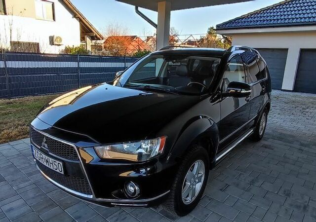 Черный Мицубиси Аутлендер, объемом двигателя 2 л и пробегом 264 тыс. км за 2900 $, фото 2 на Automoto.ua