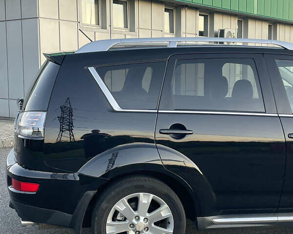 Черный Мицубиси Аутлендер, объемом двигателя 0 л и пробегом 257 тыс. км за 10399 $, фото 9 на Automoto.ua