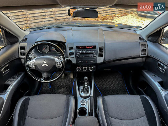 Черный Мицубиси Аутлендер, объемом двигателя 2.2 л и пробегом 226 тыс. км за 11500 $, фото 4 на Automoto.ua
