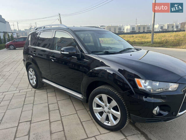 Черный Мицубиси Аутлендер, объемом двигателя 2.36 л и пробегом 244 тыс. км за 9850 $, фото 12 на Automoto.ua