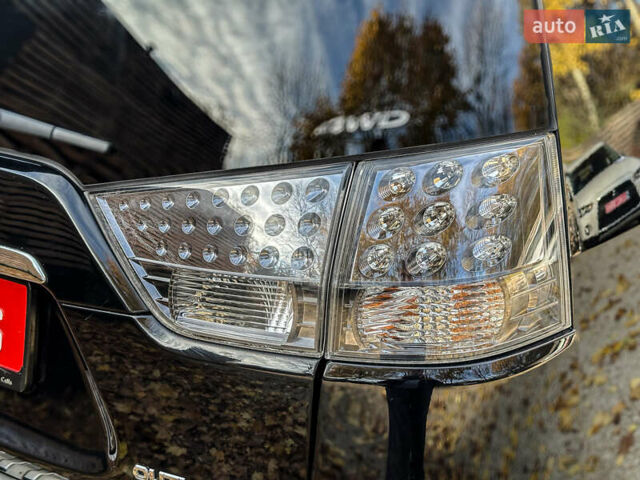 Черный Мицубиси Аутлендер, объемом двигателя 2.2 л и пробегом 226 тыс. км за 11500 $, фото 52 на Automoto.ua