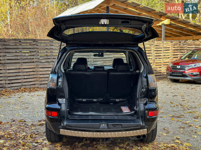 Черный Мицубиси Аутлендер, объемом двигателя 2.2 л и пробегом 226 тыс. км за 11500 $, фото 90 на Automoto.ua