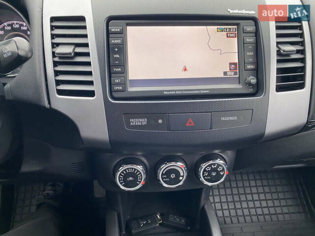 Черный Мицубиси Аутлендер, объемом двигателя 2.2 л и пробегом 227 тыс. км за 10700 $, фото 29 на Automoto.ua