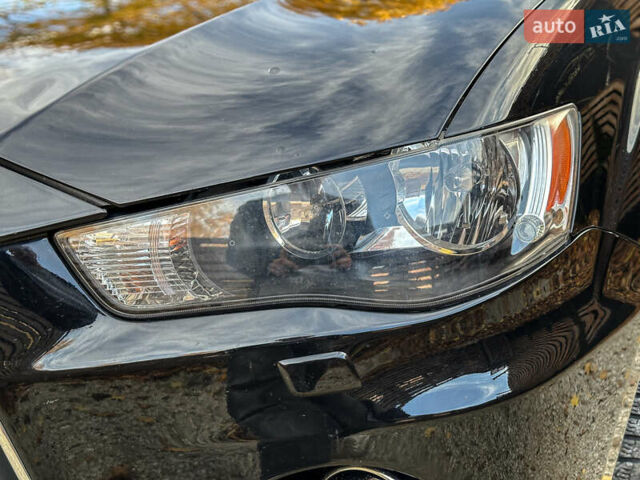 Черный Мицубиси Аутлендер, объемом двигателя 2.2 л и пробегом 226 тыс. км за 11500 $, фото 47 на Automoto.ua