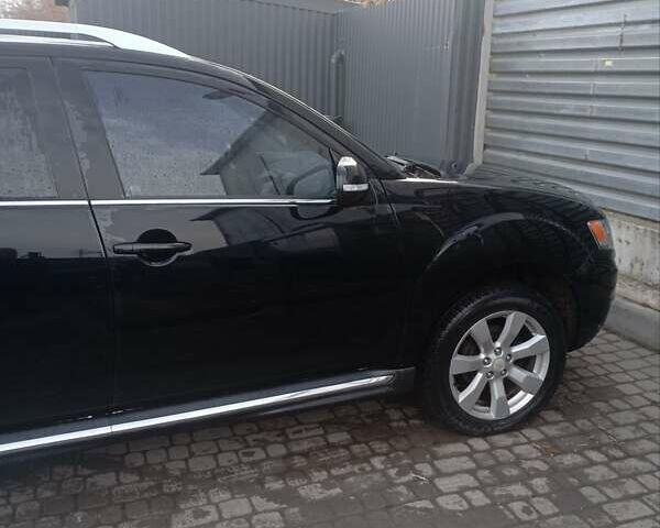 Черный Мицубиси Аутлендер, объемом двигателя 2.2 л и пробегом 264 тыс. км за 10700 $, фото 6 на Automoto.ua