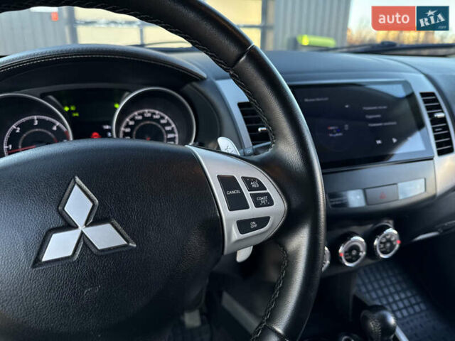 Черный Мицубиси Аутлендер, объемом двигателя 2.2 л и пробегом 263 тыс. км за 11300 $, фото 14 на Automoto.ua