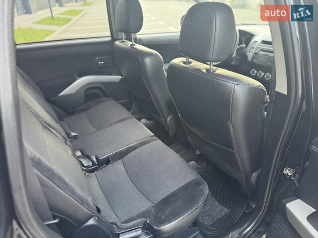 Черный Мицубиси Аутлендер, объемом двигателя 2.2 л и пробегом 225 тыс. км за 10950 $, фото 44 на Automoto.ua