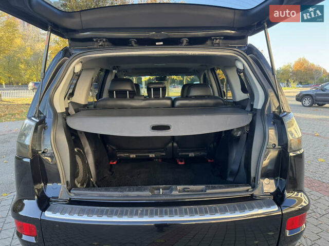 Черный Мицубиси Аутлендер, объемом двигателя 3 л и пробегом 162 тыс. км за 10800 $, фото 18 на Automoto.ua