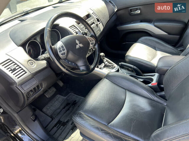 Чорний Міцубісі Аутлендер, об'ємом двигуна 2.2 л та пробігом 214 тис. км за 10600 $, фото 14 на Automoto.ua