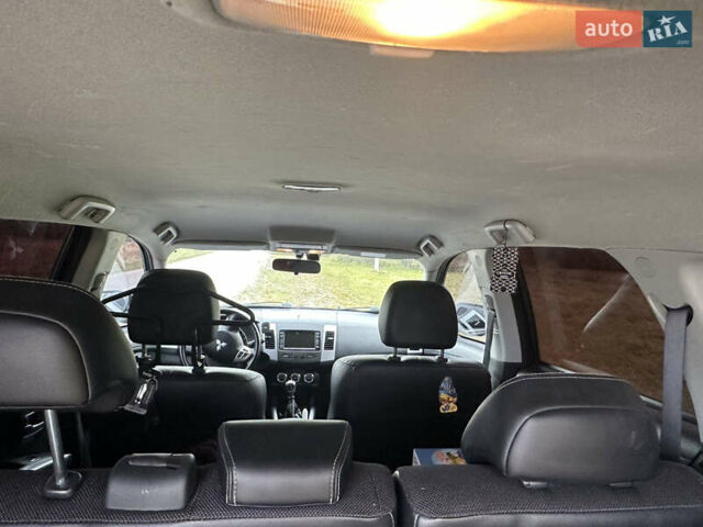 Черный Мицубиси Аутлендер, объемом двигателя 1.97 л и пробегом 224 тыс. км за 9000 $, фото 7 на Automoto.ua