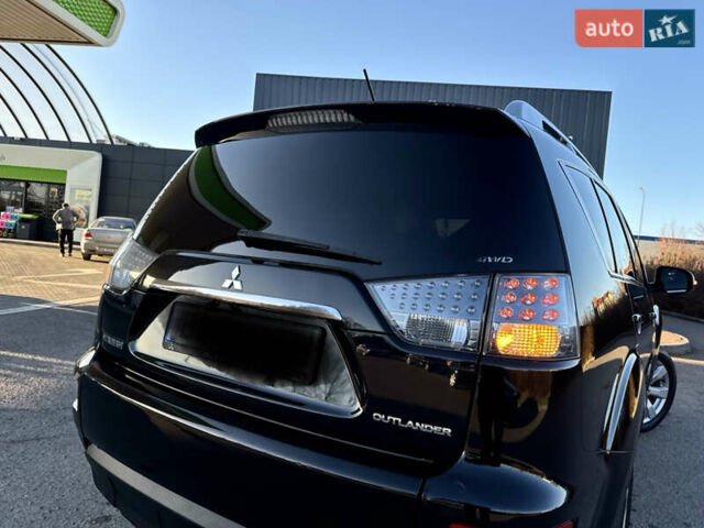 Черный Мицубиси Аутлендер, объемом двигателя 2.2 л и пробегом 263 тыс. км за 11300 $, фото 9 на Automoto.ua