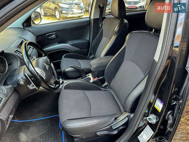 Черный Мицубиси Аутлендер, объемом двигателя 2.2 л и пробегом 226 тыс. км за 11500 $, фото 62 на Automoto.ua