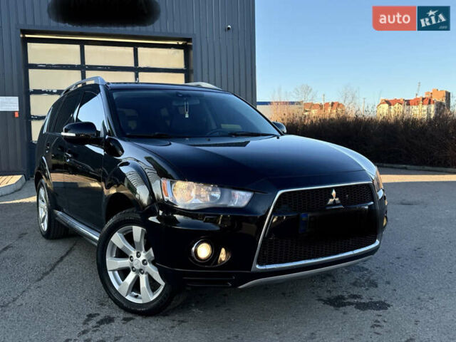 Черный Мицубиси Аутлендер, объемом двигателя 2.2 л и пробегом 263 тыс. км за 11300 $, фото 1 на Automoto.ua