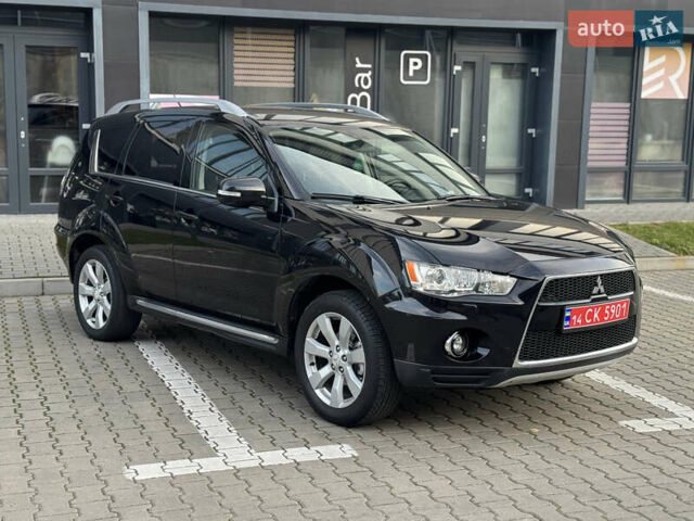 Черный Мицубиси Аутлендер, объемом двигателя 2.2 л и пробегом 225 тыс. км за 10950 $, фото 9 на Automoto.ua