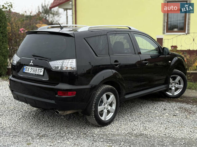 Черный Мицубиси Аутлендер, объемом двигателя 2.4 л и пробегом 184 тыс. км за 10800 $, фото 9 на Automoto.ua