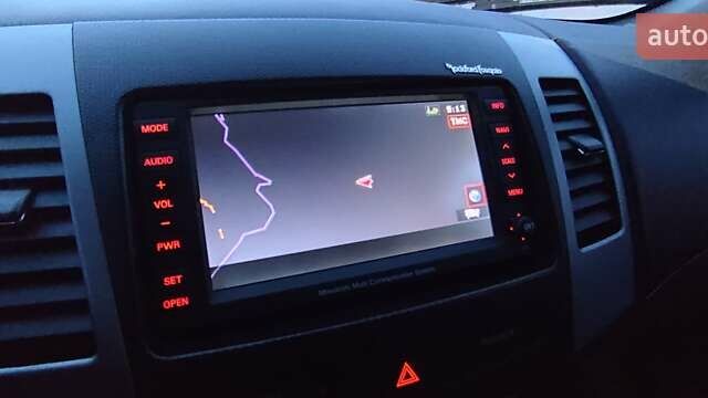 Черный Мицубиси Аутлендер, объемом двигателя 2 л и пробегом 210 тыс. км за 10600 $, фото 37 на Automoto.ua