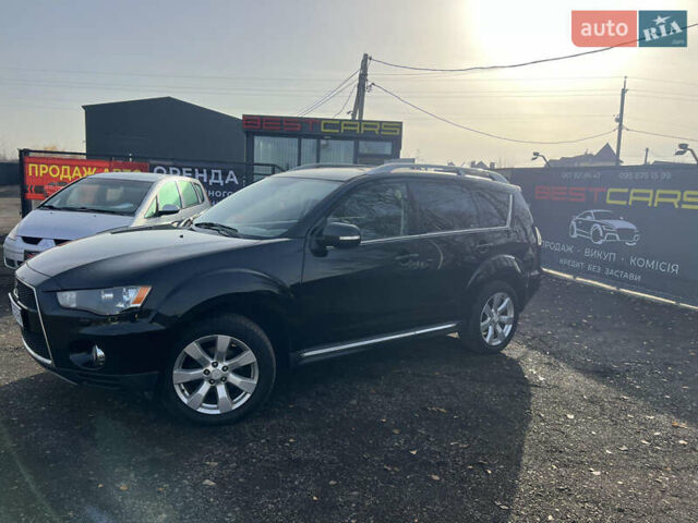 Черный Мицубиси Аутлендер, объемом двигателя 2.36 л и пробегом 244 тыс. км за 9850 $, фото 14 на Automoto.ua