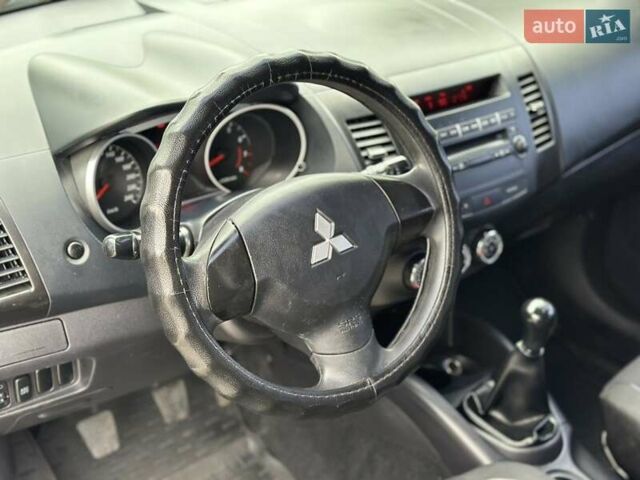 Мицубиси Аутлендер 2010 в Днепре (Днепропетровске) на Automoto.ua Черный Мицубиси Аутлендер, объемом двигателя 2 л и пробегом 220 тыс. км за 8900 $, фото 22 на Automoto.ua