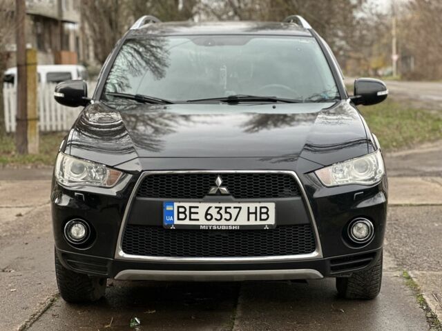 Черный Мицубиси Аутлендер, объемом двигателя 2.4 л и пробегом 197 тыс. км за 11300 $, фото 4 на Automoto.ua