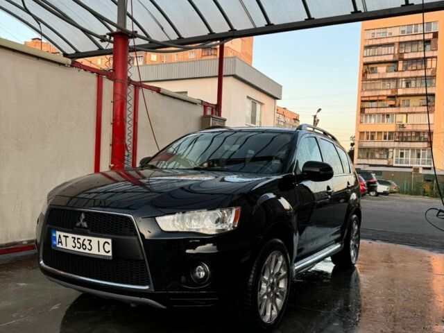 Черный Мицубиси Аутлендер, объемом двигателя 0 л и пробегом 215 тыс. км за 9500 $, фото 1 на Automoto.ua