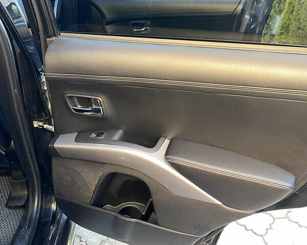 Черный Мицубиси Аутлендер, объемом двигателя 1.97 л и пробегом 292 тыс. км за 10900 $, фото 16 на Automoto.ua