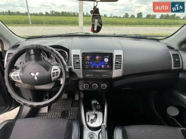 Чорний Міцубісі Аутлендер, об'ємом двигуна 2.4 л та пробігом 187 тис. км за 10200 $, фото 7 на Automoto.ua