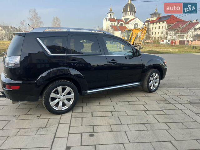 Черный Мицубиси Аутлендер, объемом двигателя 2.36 л и пробегом 244 тыс. км за 9850 $, фото 7 на Automoto.ua