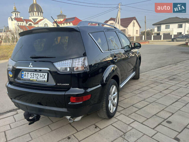 Черный Мицубиси Аутлендер, объемом двигателя 2.36 л и пробегом 244 тыс. км за 9850 $, фото 9 на Automoto.ua