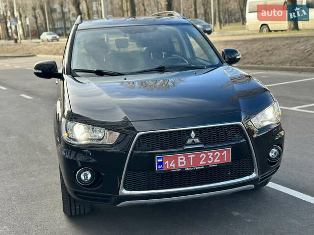 Чорний Міцубісі Аутлендер, об'ємом двигуна 2.3 л та пробігом 212 тис. км за 11200 $, фото 1 на Automoto.ua