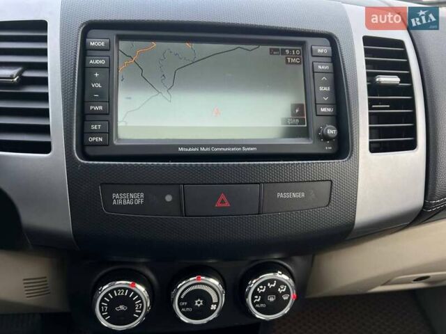 Черный Мицубиси Аутлендер, объемом двигателя 2.18 л и пробегом 249 тыс. км за 11500 $, фото 24 на Automoto.ua