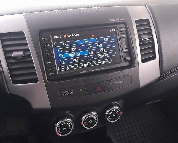 Черный Мицубиси Аутлендер, объемом двигателя 1.97 л и пробегом 232 тыс. км за 10800 $, фото 13 на Automoto.ua