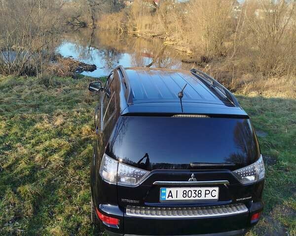 Черный Мицубиси Аутлендер, объемом двигателя 2 л и пробегом 261 тыс. км за 9700 $, фото 14 на Automoto.ua