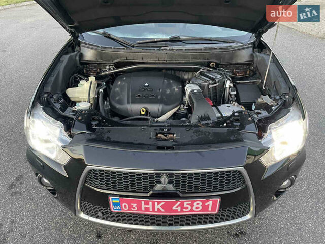 Черный Мицубиси Аутлендер, объемом двигателя 0 л и пробегом 257 тыс. км за 10399 $, фото 38 на Automoto.ua