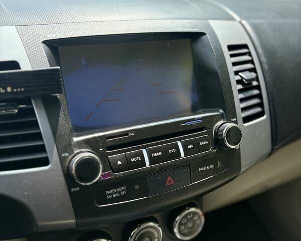 Черный Мицубиси Аутлендер, объемом двигателя 2.4 л и пробегом 275 тыс. км за 12000 $, фото 14 на Automoto.ua